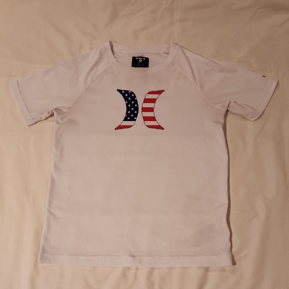 Hurley White Tee with American Flag Graphic. Size Medium